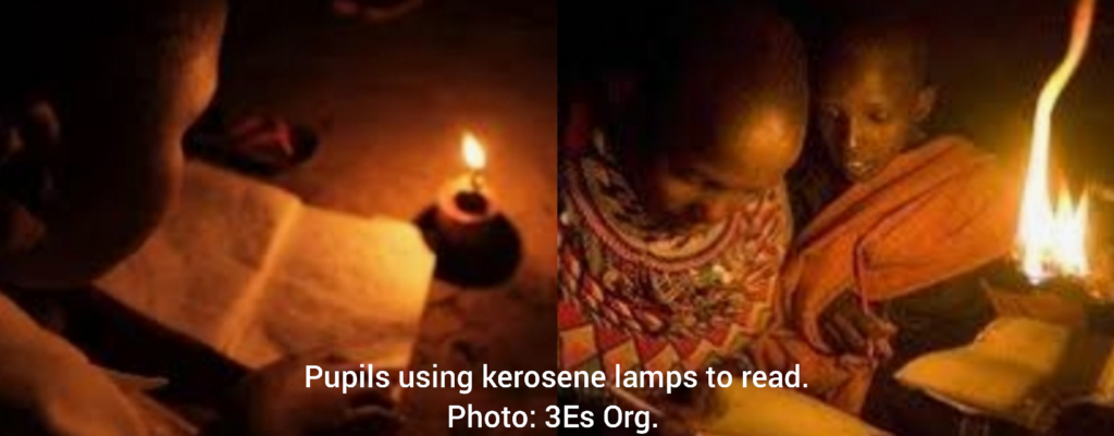 Pupils using kerosene lamps to read